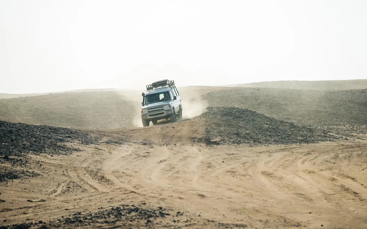 Off-road vehicle on a desert track