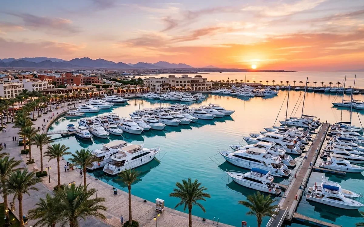 Boats and waterfront buildings in warm evening light