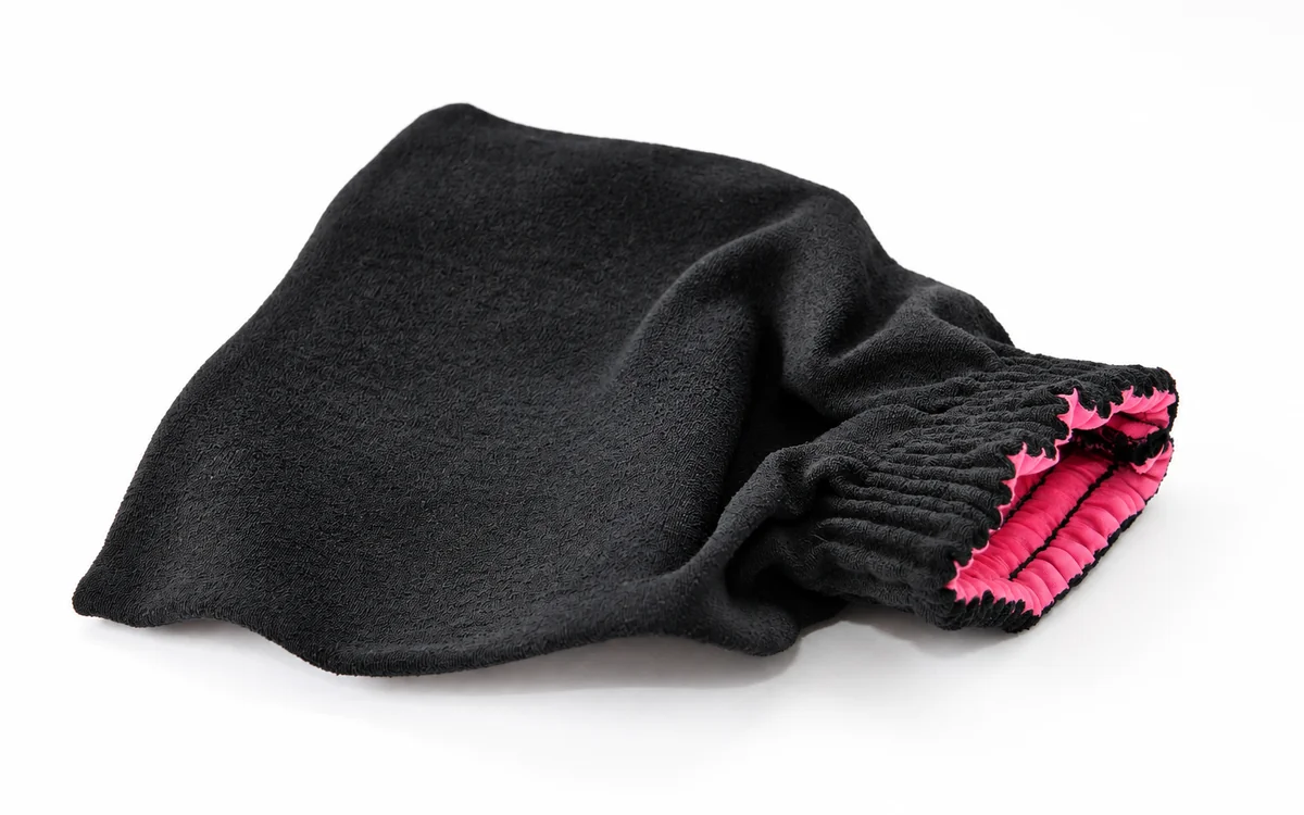 Representative image: black exfoliating scrub glove